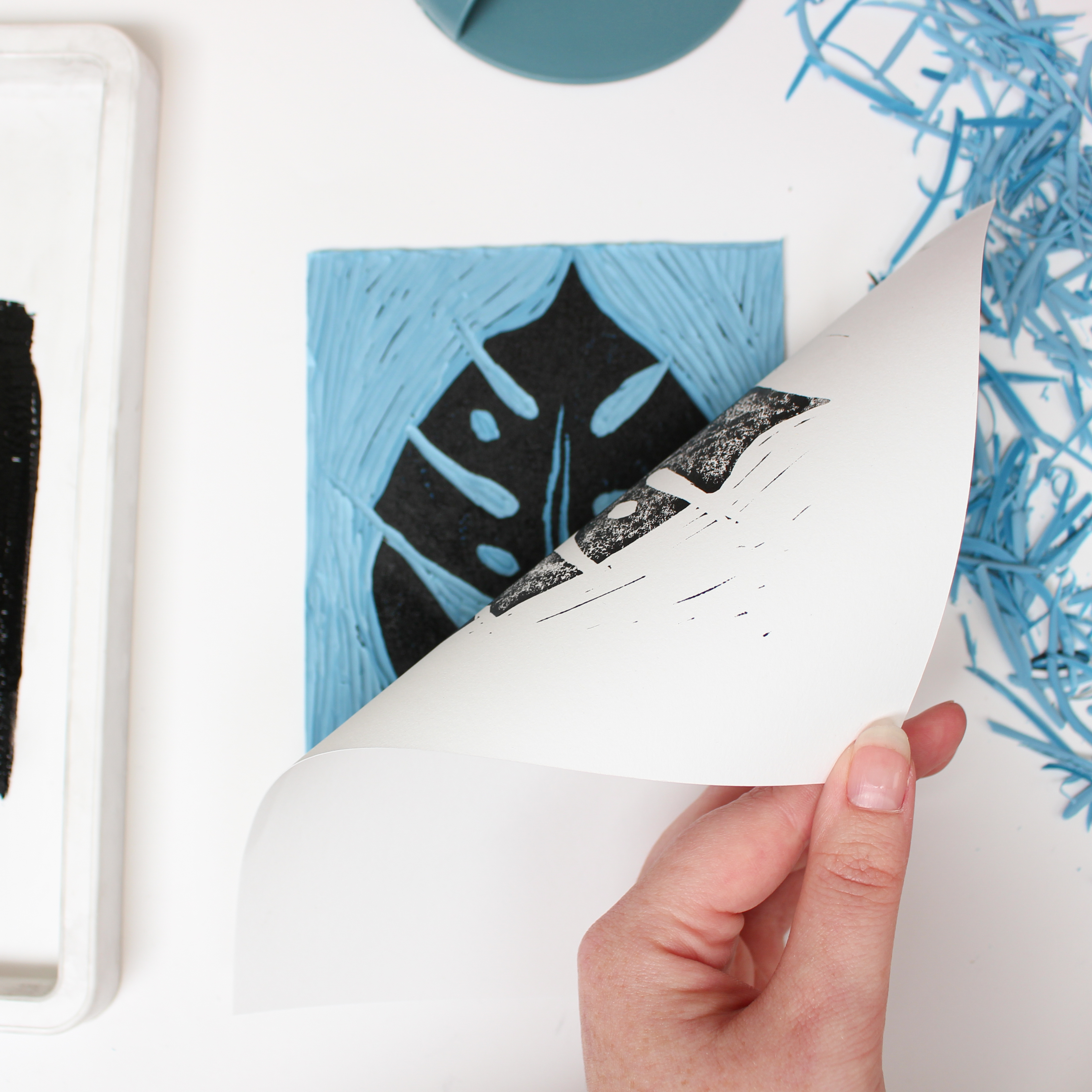 Peeling back the paper from the Inked Lino