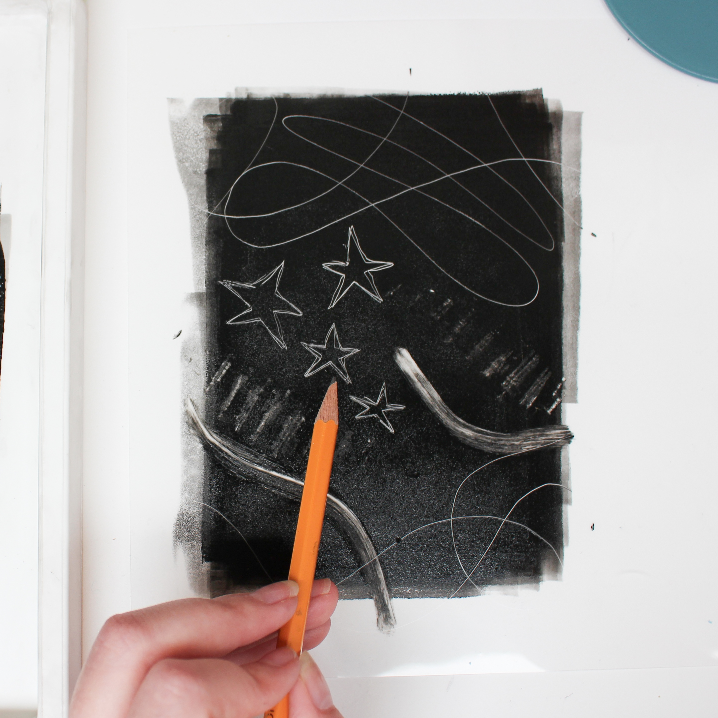 drawing onto the inked surface