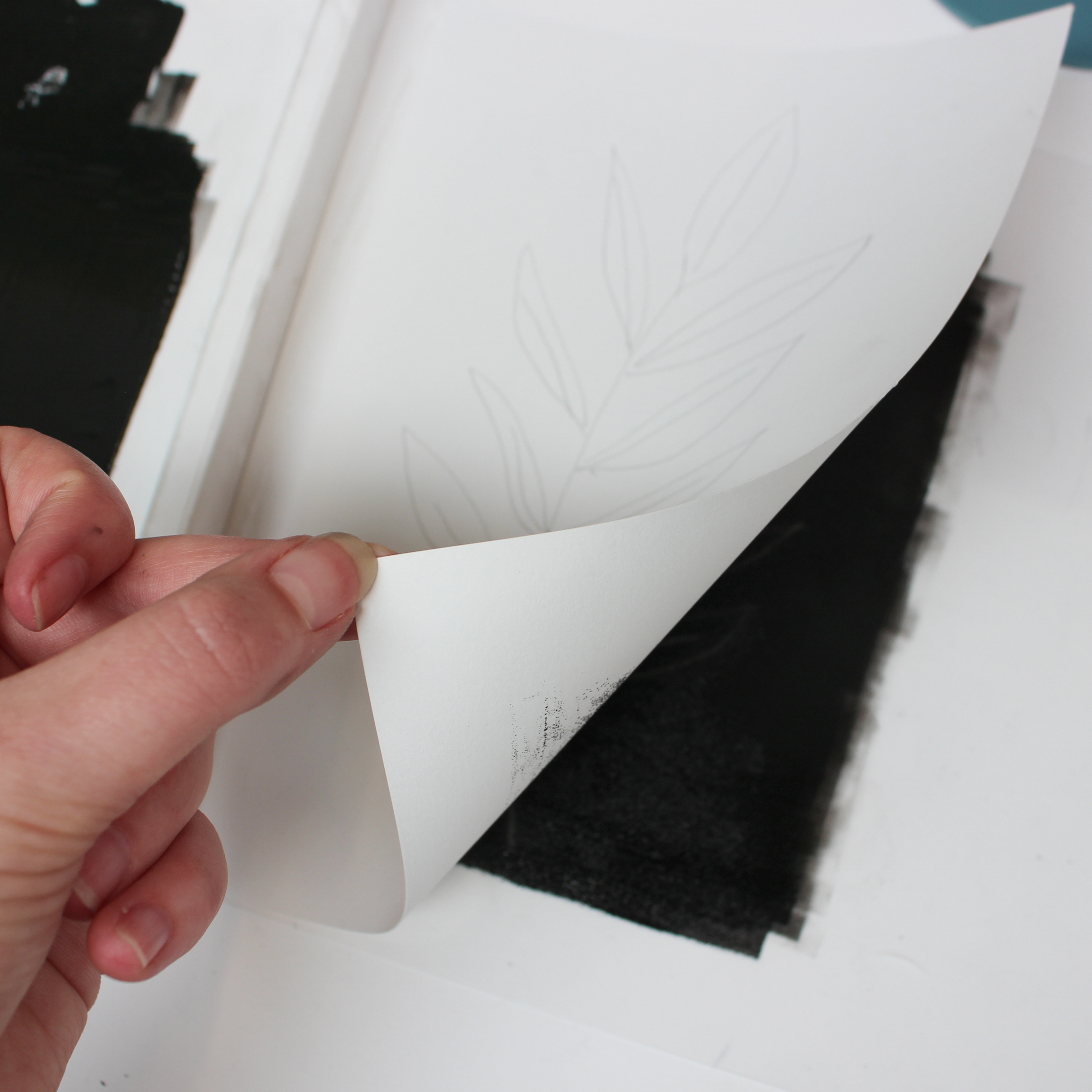 Placing paper onto the ink